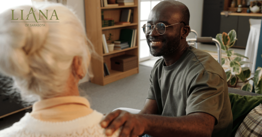 Man gently comforting an older woman during the transition to assisted living