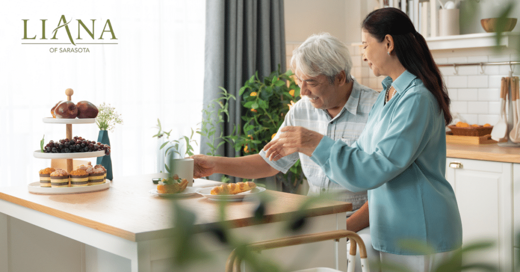 Senior couple enjoying tea at home while discussing Parkinson's disease care and daily support.