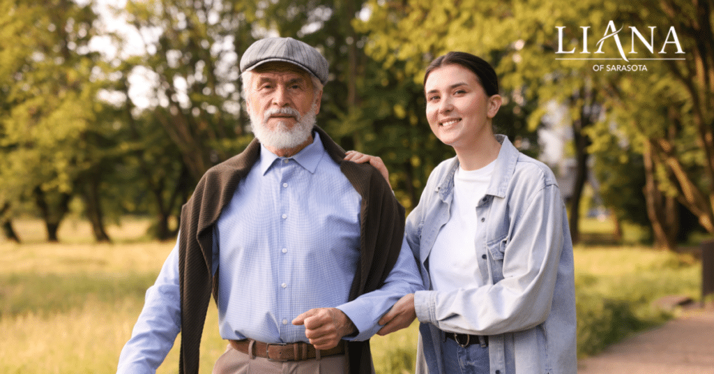 A smiling elderly man walking with a care partner in a park, enjoying fresh air and companionship, emphasizing it's time for memory care.
