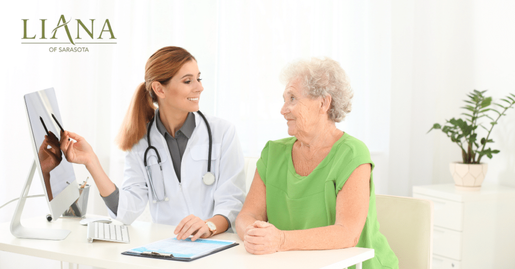 Doctor discussing brain health with an older woman during a wellness visit to help prevent dementia