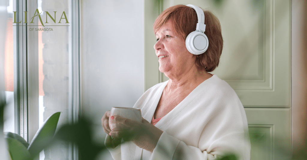 Older woman enjoying music as one of many memory-friendly activities that can support calm, comfort, and daily well-being.